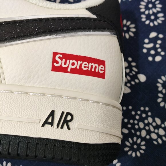 Supreme x Nike Air Force 1 White & Black Sneakers